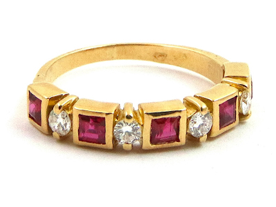 Zlatý dámský prsten 750/1000 s diamanty a rubíny